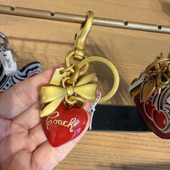 Coach  CZ276 Bow Heart Locket Bag Charm - Picture 1 of 6